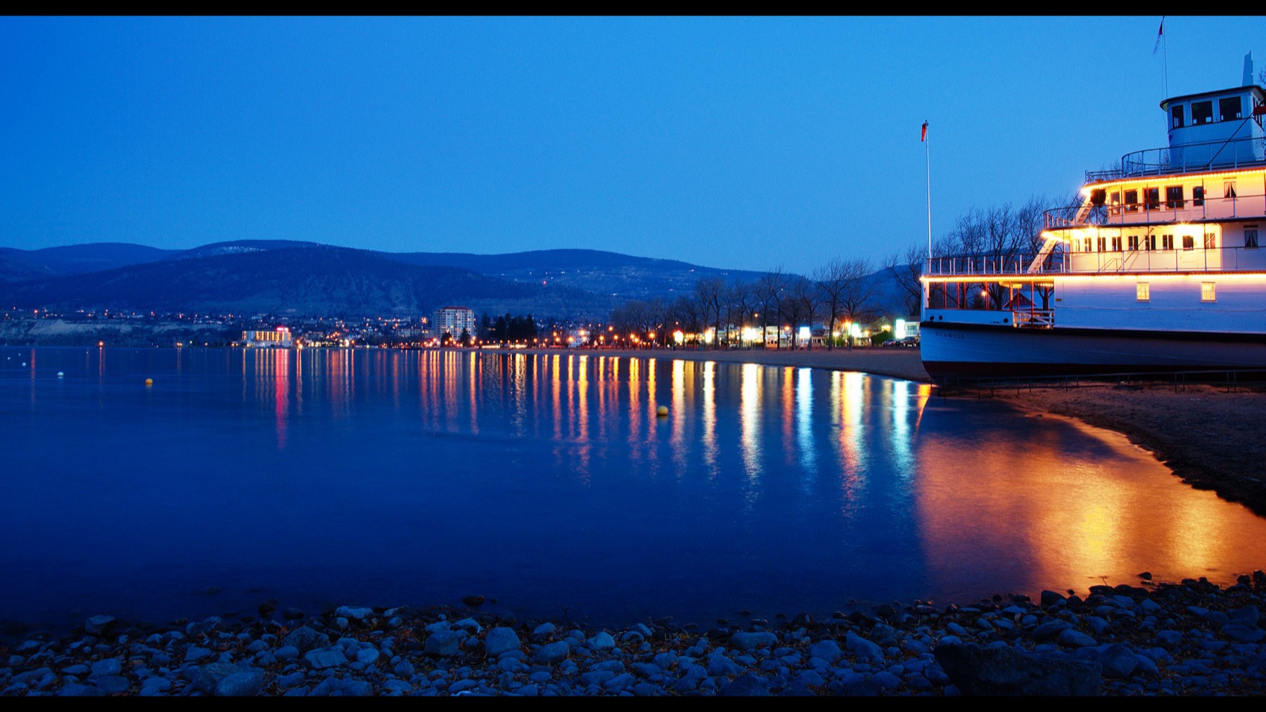 Okanagan Lake waterfront and the SS Sicamous in Penticton at dusk