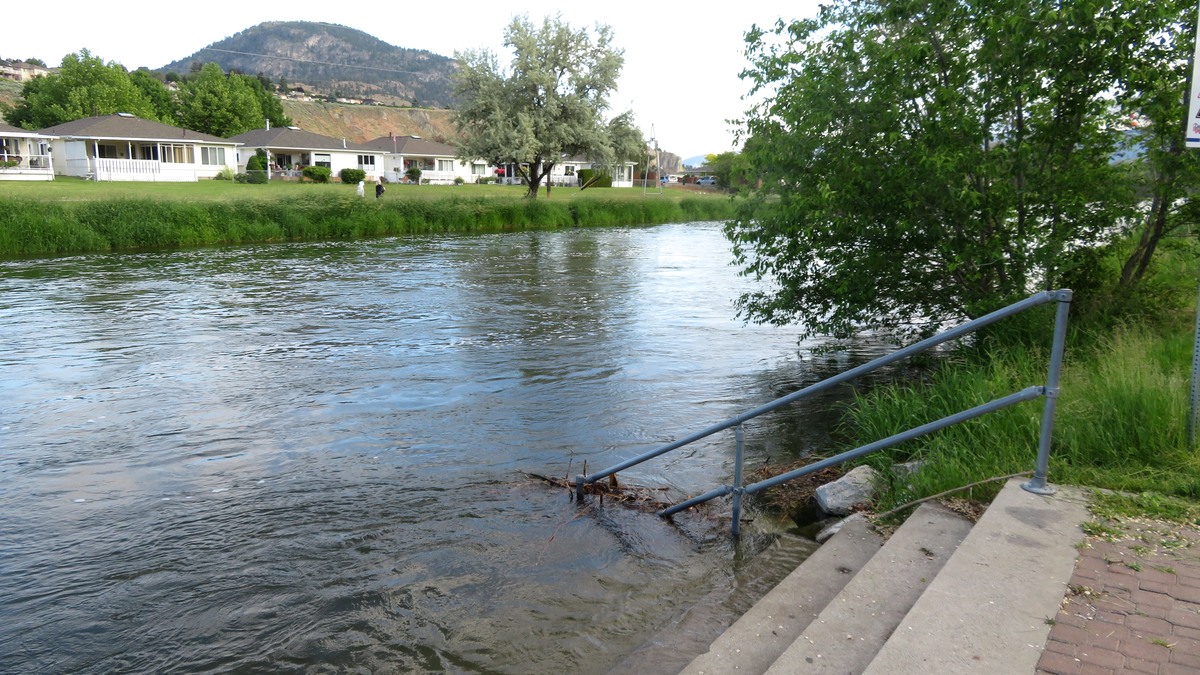 Homes beside Penticton Creek in Penticton, British Columbia